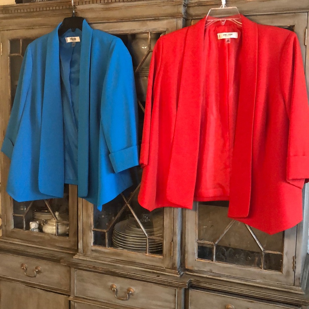 2 beautiful like new 14W jackets, 1 blue, 1 orange